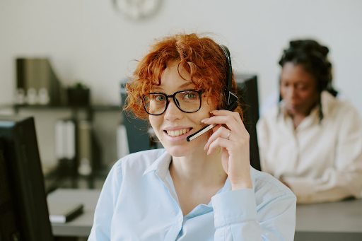 A customer service adviser uses omnichannel customer experience solutions to help residents resolve complaints efficiently.