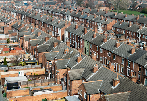 An aerial view of residential properties representing the communities supported by social housing software providers.